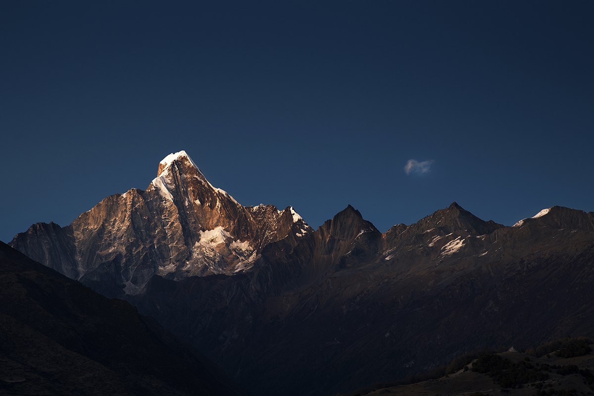 Sunset of Siguniang Shan Mountain | Foto de Min Zhao